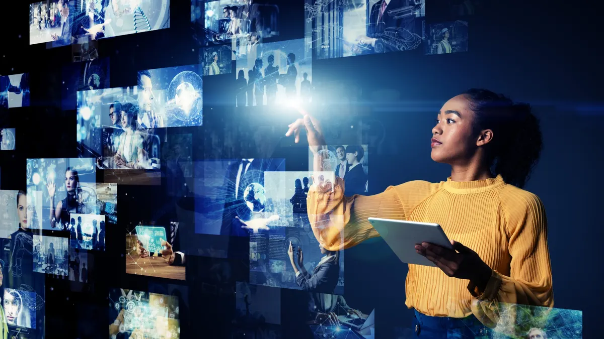 holographic visuals with a person scrolling through them